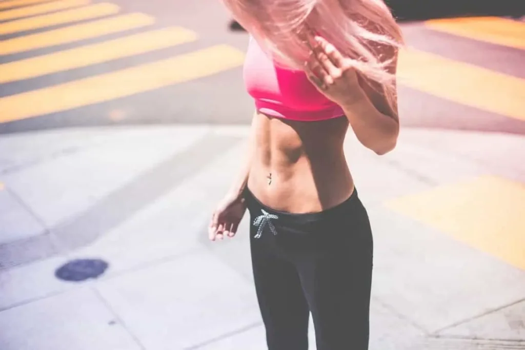 Woman with toned stomach after LA-EMS Body Sculpting Treatment Hampton Hill